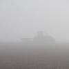 Tracteur dans le brouillard